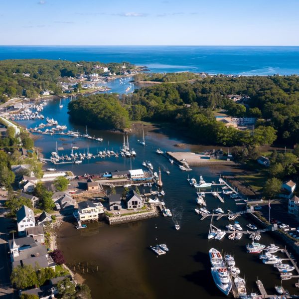 a large body of water with a city in the background