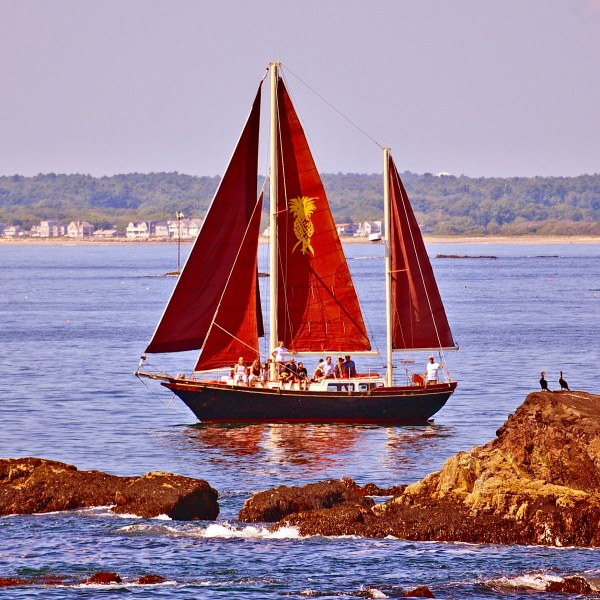 a small boat in a large body of water