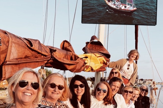 a group of people posing for the camera