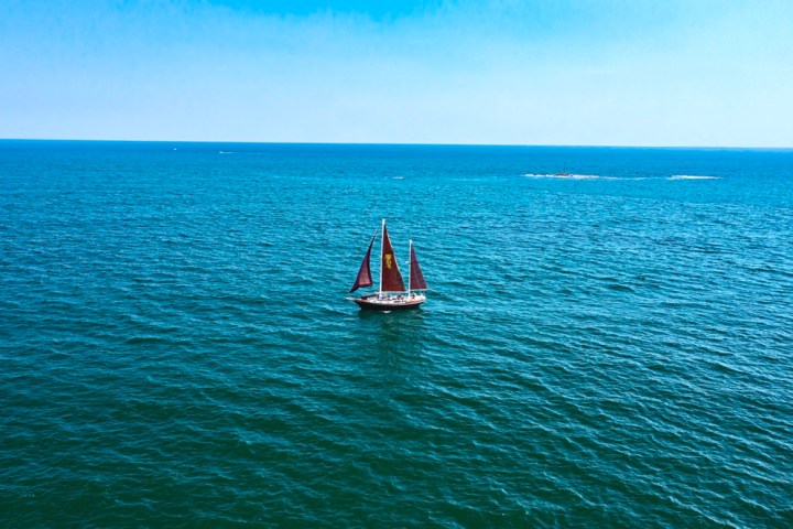 a small boat in a large body of water