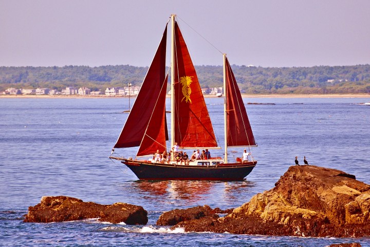 a small boat in a large body of water