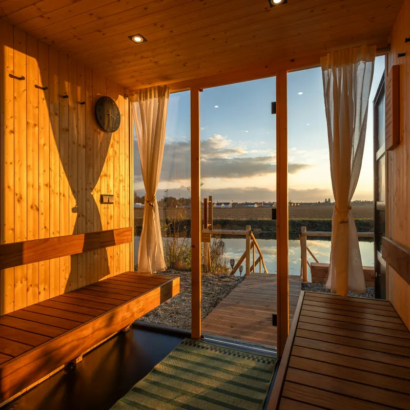a wooden pier next to water